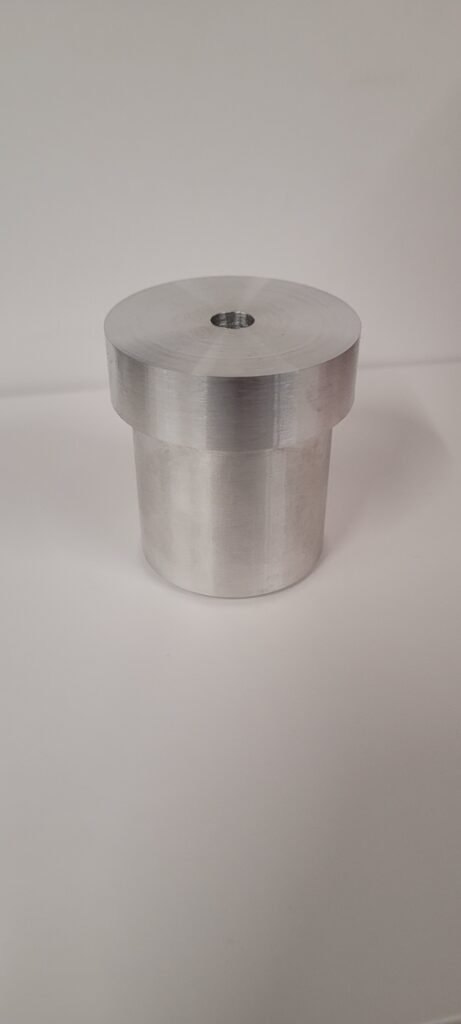 une piece mecanique de revolution usinée en tournage aluminium